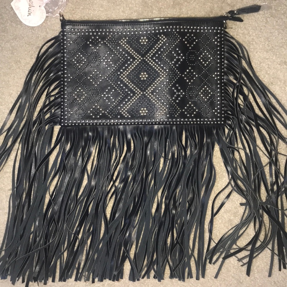 Studded clutch purse with leather fringe